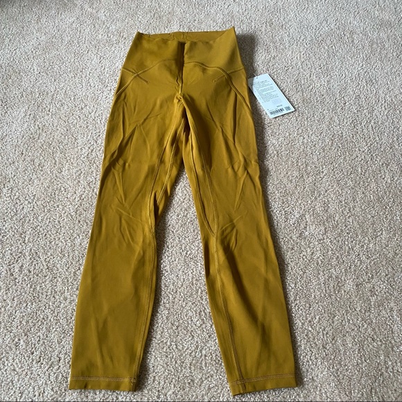 SOLD NWT Lululemon Unlimit Tight 25” Size 4 Gold Spice - Picture 1 of 7